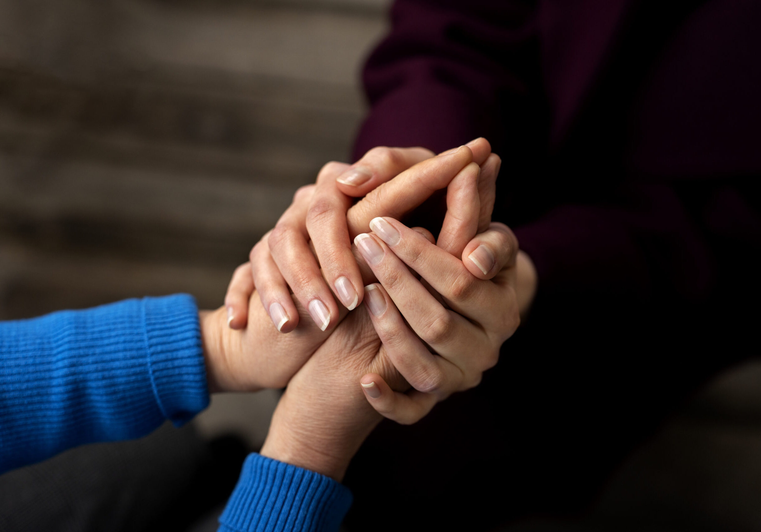 hands-holding-each-other-support